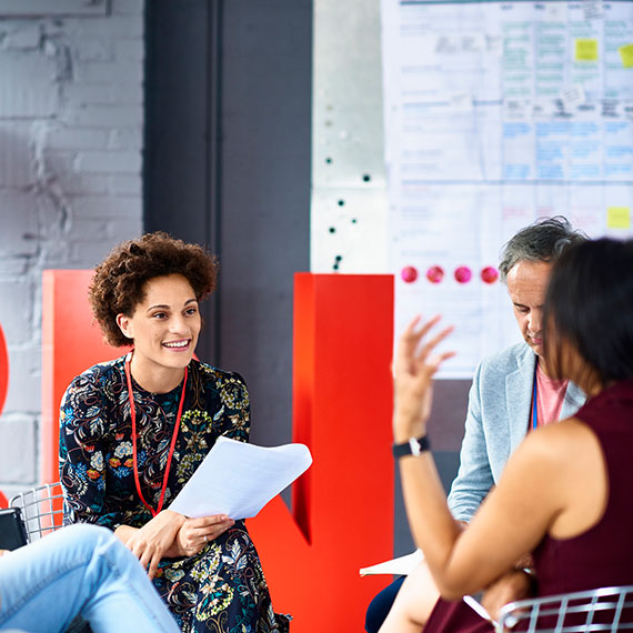 A group of people in a meeting