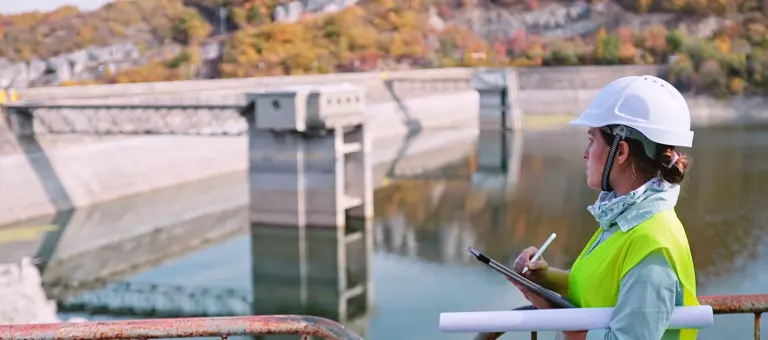 Worker inspecting a water facility