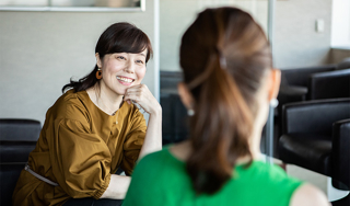 Two business woman having a conversation