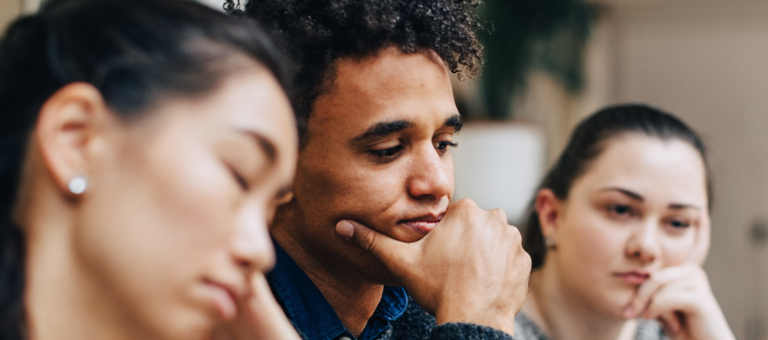 business colleagues sitting at desk in office