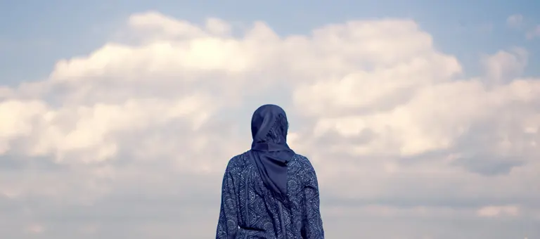 Woman looking out to sky