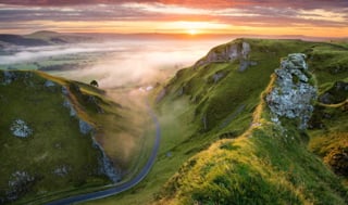 A road through green mountains