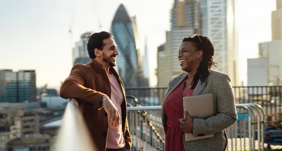 Two people having a conversation in London
