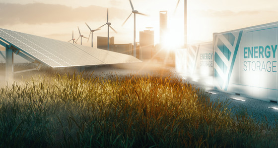 Solar Panels, wind turbines and energy storage units in a grassy field