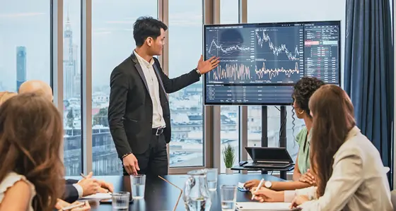Group of people in a business meeting analysing data