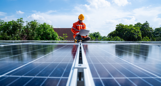 Solar engineer on a roof