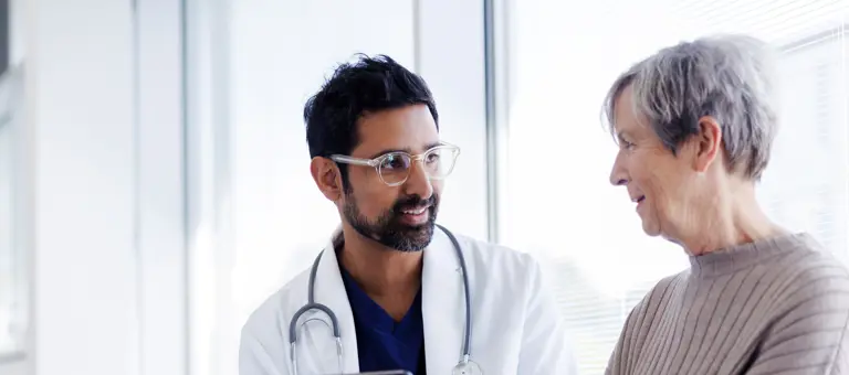 A doctor and a patient talking together