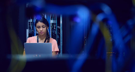 Young woman working in a data centre