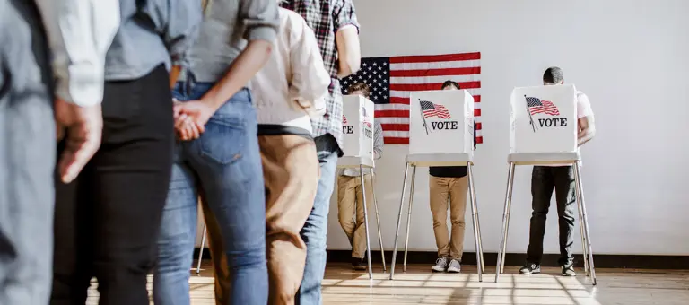 People queuing to vote in an American polling station
