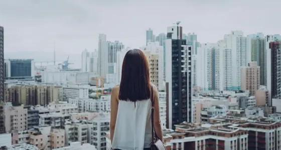 Woman looking at a city