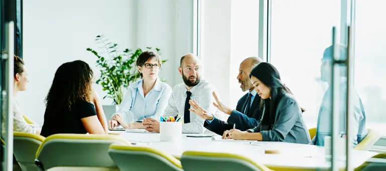 People having a discussion in a meeting room