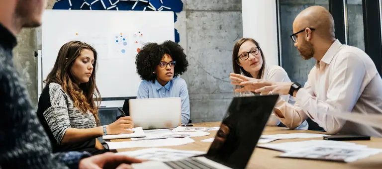 People having a discussion in a meeting room