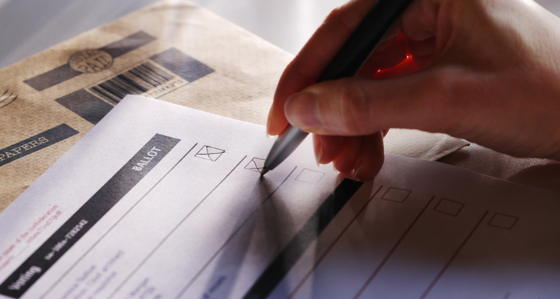 Person filling in a ballot