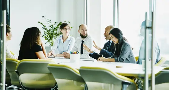 People having a discussion in a meeting room