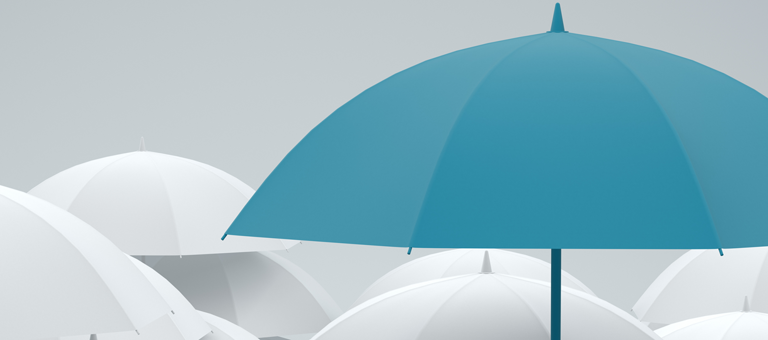 One blue umbrella among several white umbrellas