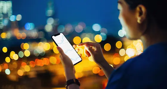 Woman looking at her smartphone