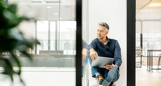 Man sitting on a desk