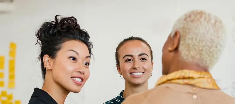 A group of people having a conversation