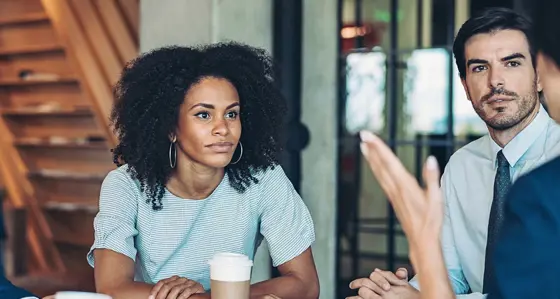 A group of people having a conversation