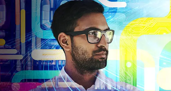 A man's face superimposed on a background with pipes and electronic circuits