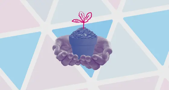Hands holding a flower pot containing coins