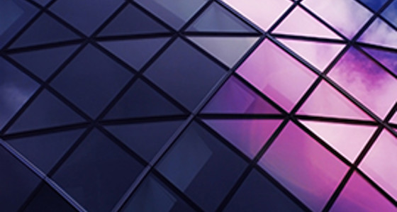 A close-up of coloured windows arranged in a diamond pattern