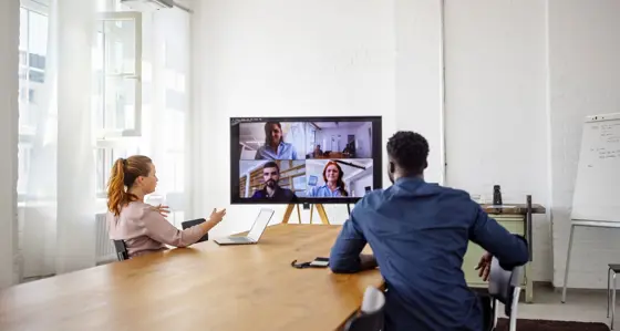 Businesspeople having a video conference in office